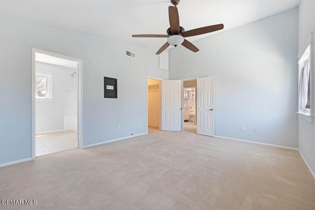 1902 Rambling Road Simi Valley, CA 93065 - Photo 49 of 67 an empty room with closet and fan