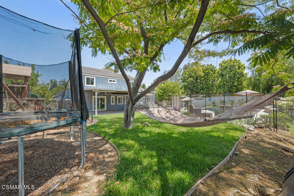 1902 Rambling Road Simi Valley, CA 93065 - Photo 56 of 67 a view of a house with a backyard