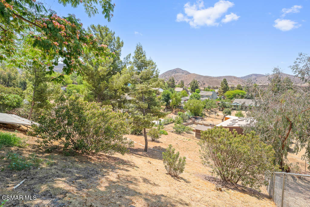 1902 Rambling Road Simi Valley, CA 93065 - Photo 57 of 67 a view of a yard with a tree
