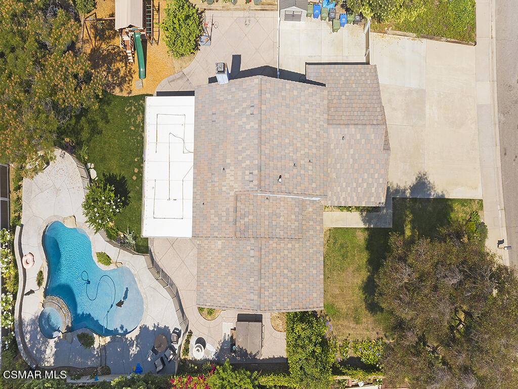 1902 Rambling Road Simi Valley, CA 93065 - Photo 7 of 67 an aerial view of a house with a yard and large trees