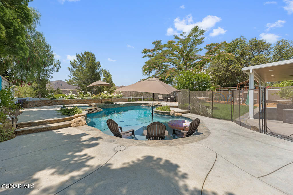 1902 Rambling Road Simi Valley, CA 93065 - Photo 63 of 67 a park view with a bench and trees