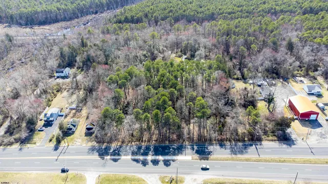 a view of swimming pool with a yard and seating area