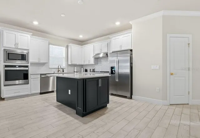 $469,000 | 4012 Meandering Bay Drive, Apopka, FL 32712