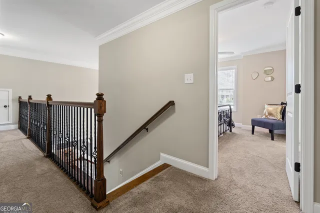 a bathroom with a granite countertop sink a mirror and shower