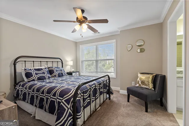 a bedroom with a bed furniture and a window