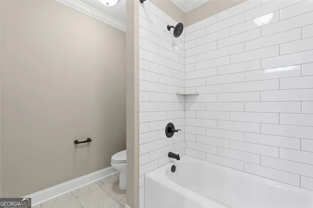 a view of a chairs and table in the balcony