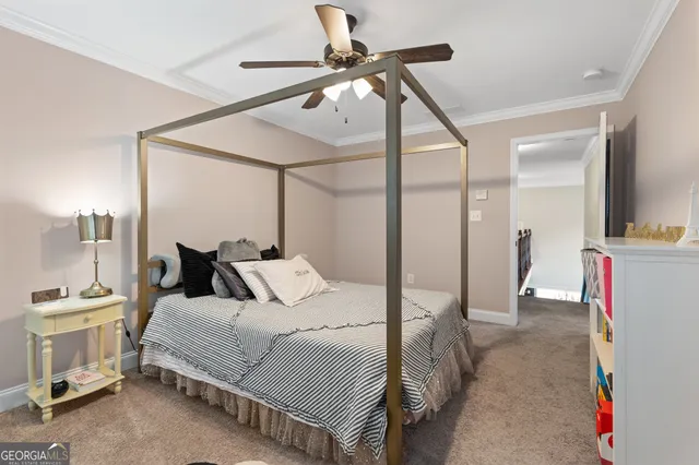 a view of a house with a large window and many windows