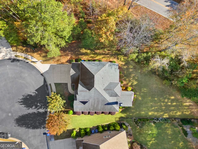 a view of an entryway with wooden floor and a front door