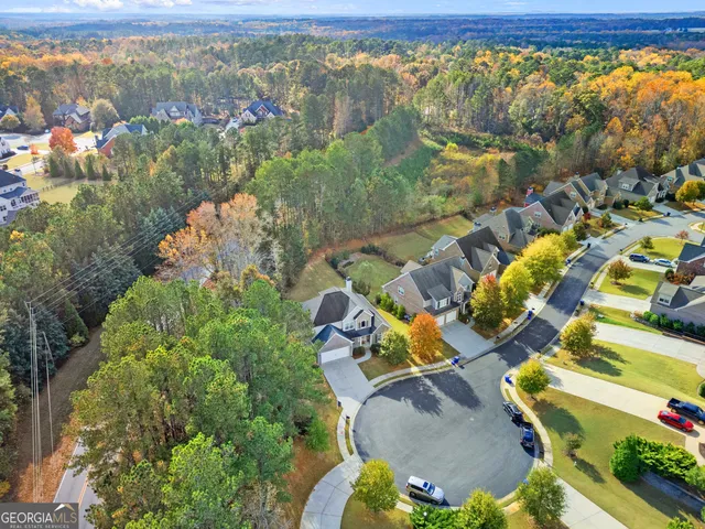 a view of a livingroom with furniture and window