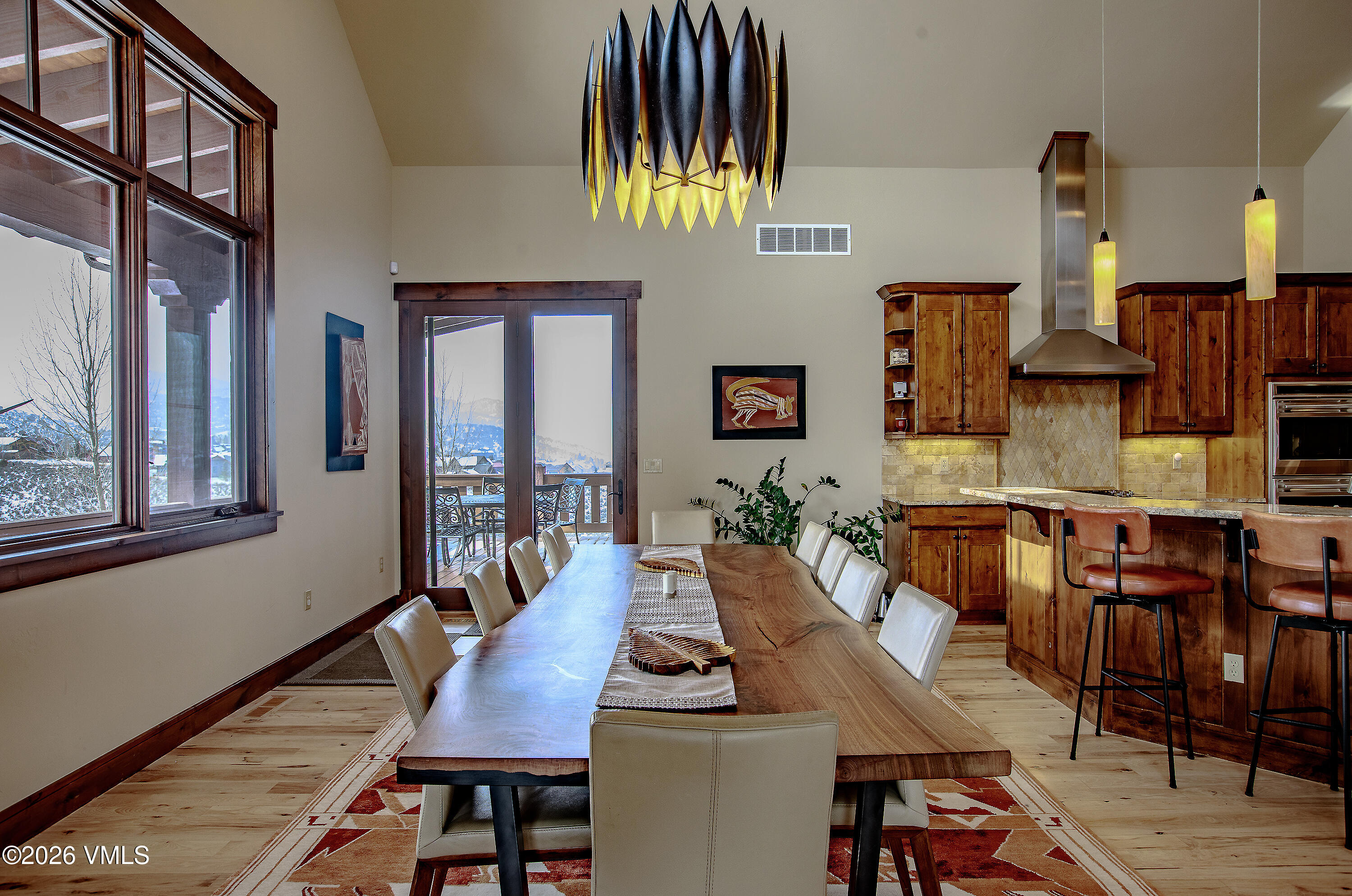 2753 East Haystacker Drive Eagle, CO 81631 - Photo 11 of 41 a view of a dining room with furniture window and wooden floor