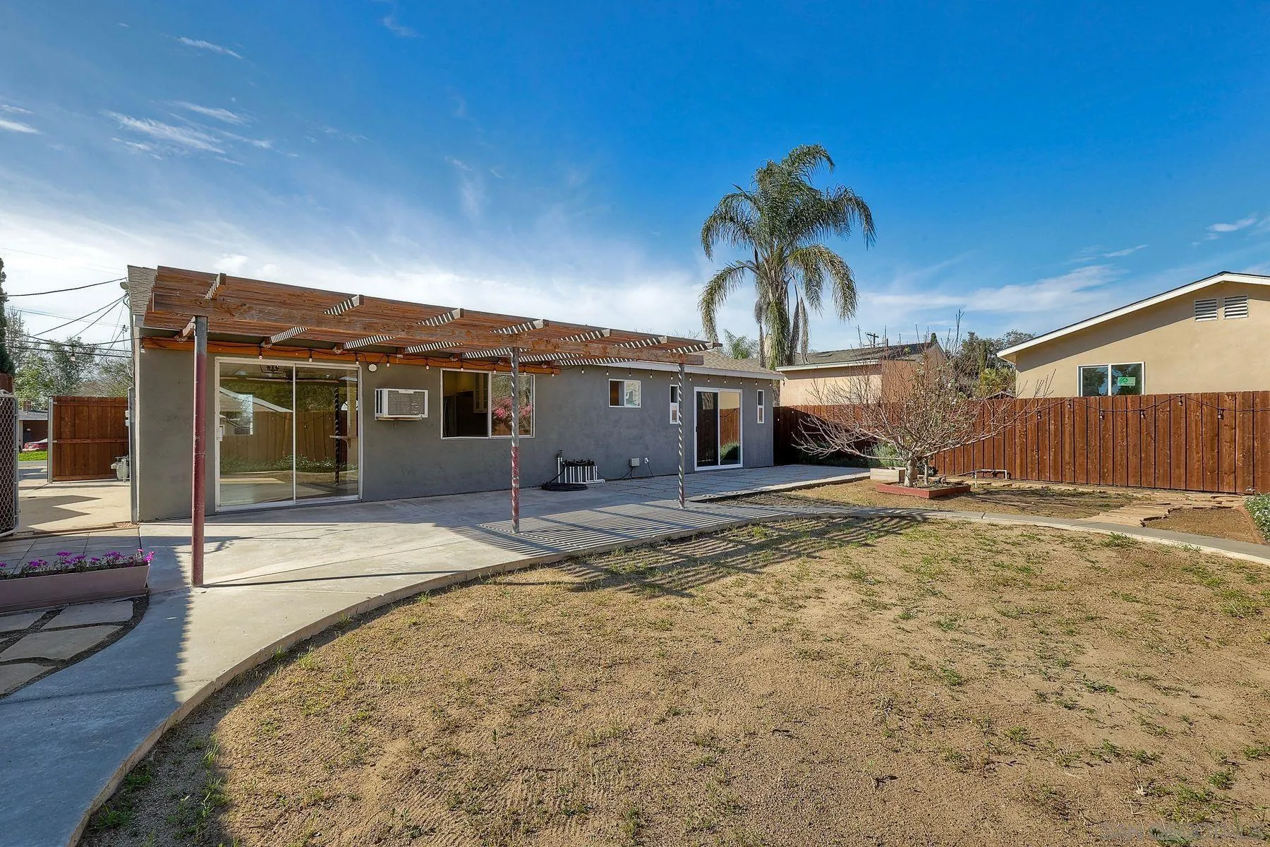 2371-75 Berry Street Lemon Grove, CA 91945 - Photo 21 of 56 a view of a house with a backyard