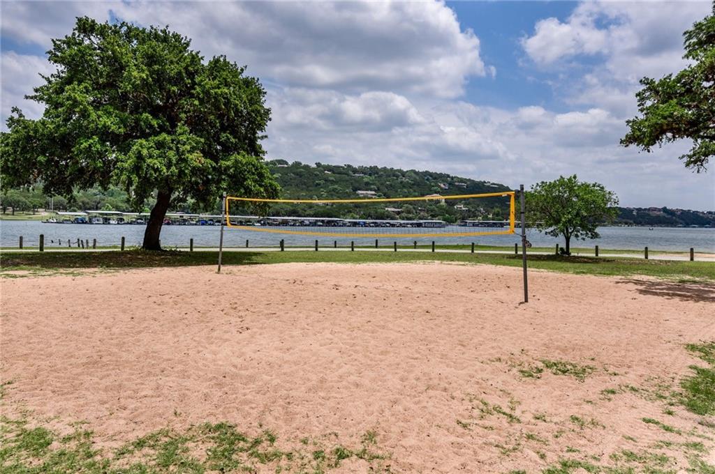 6719 Bar K Ranch Road Lago Vista, TX 78645 - Photo 34 of 36 a view of a tennis court