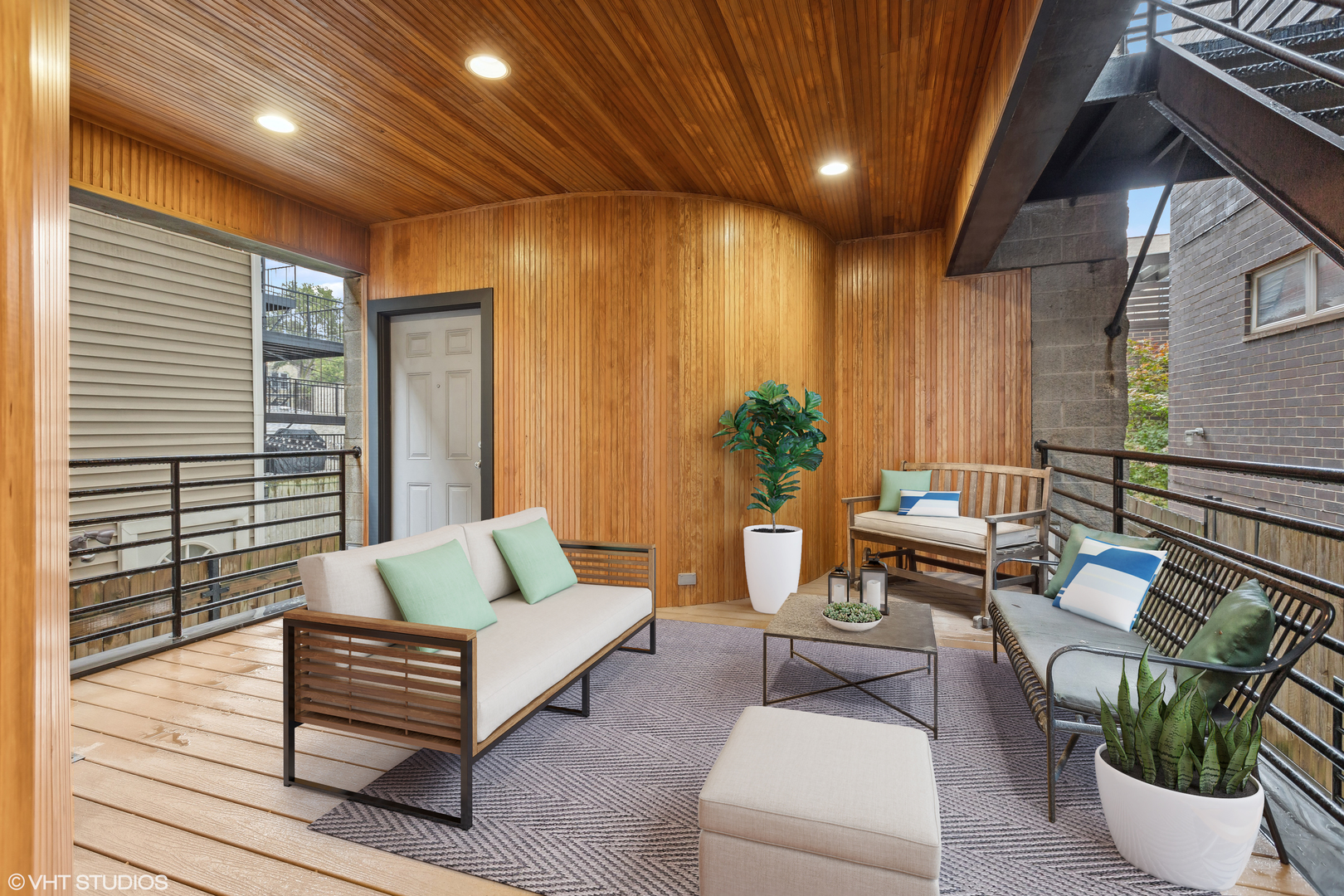 1834 West Rice Street, Unit A Chicago, IL 60622 - Photo 11 of 39 a outdoor living space with furniture and a potted plant