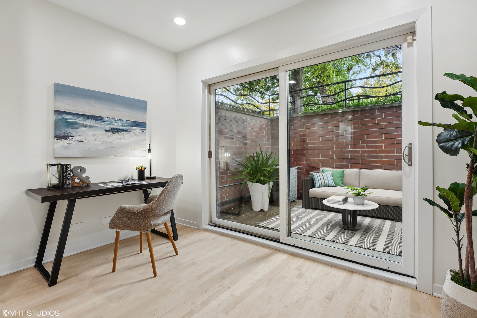 1834 West Rice Street, Unit A Chicago, IL 60622 - Photo 19 of 39 a living room with furniture and a potted plant