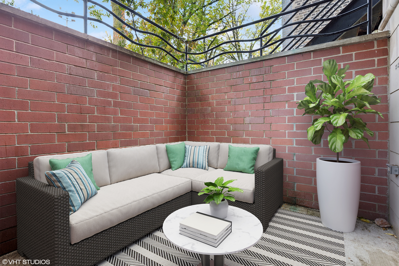 1834 West Rice Street, Unit A Chicago, IL 60622 - Photo 20 of 39 a view of a patio with couches and potted plants