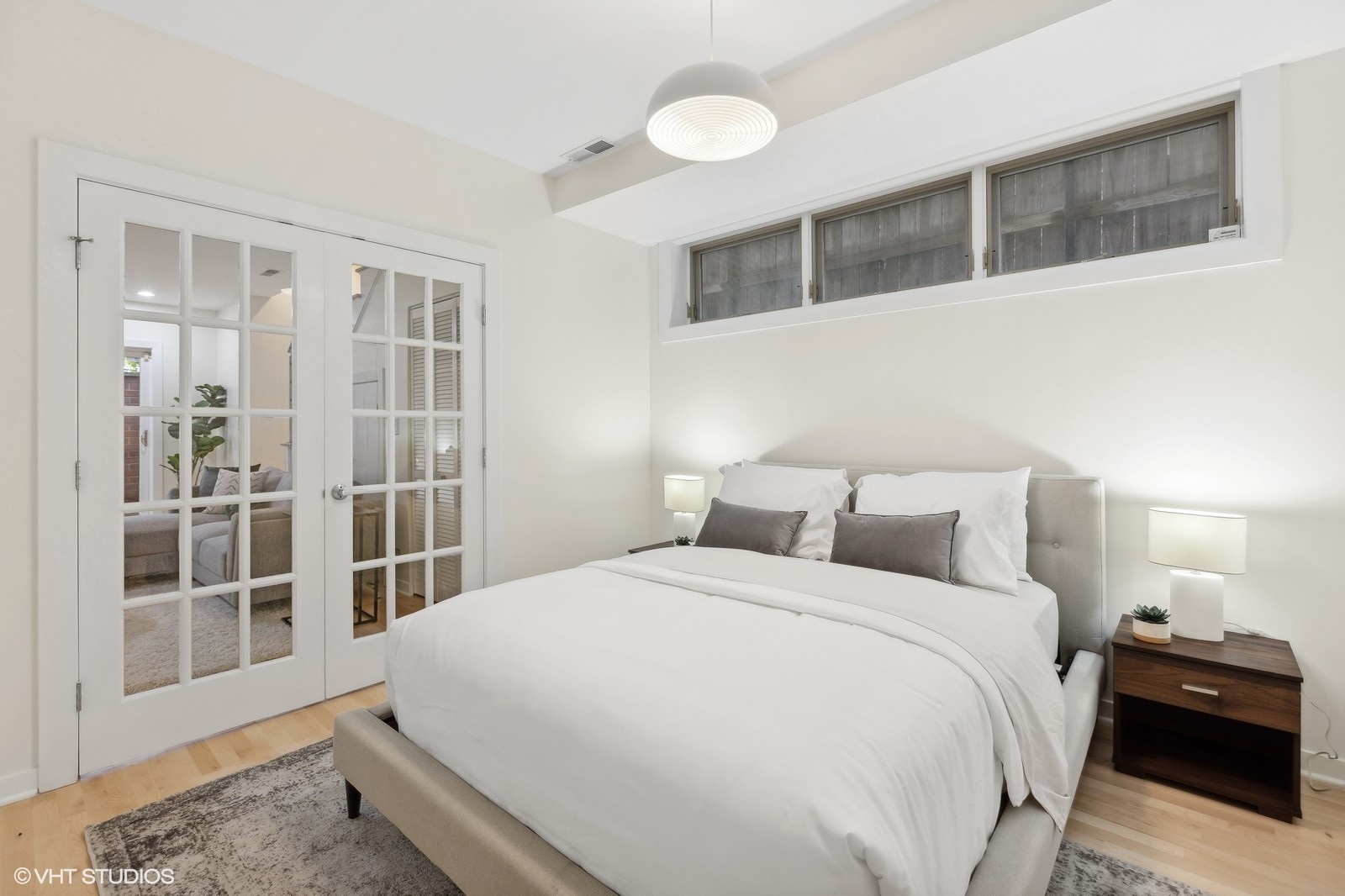 1834 West Rice Street, Unit A Chicago, IL 60622 - Photo 24 of 39 a large white bed in a white room