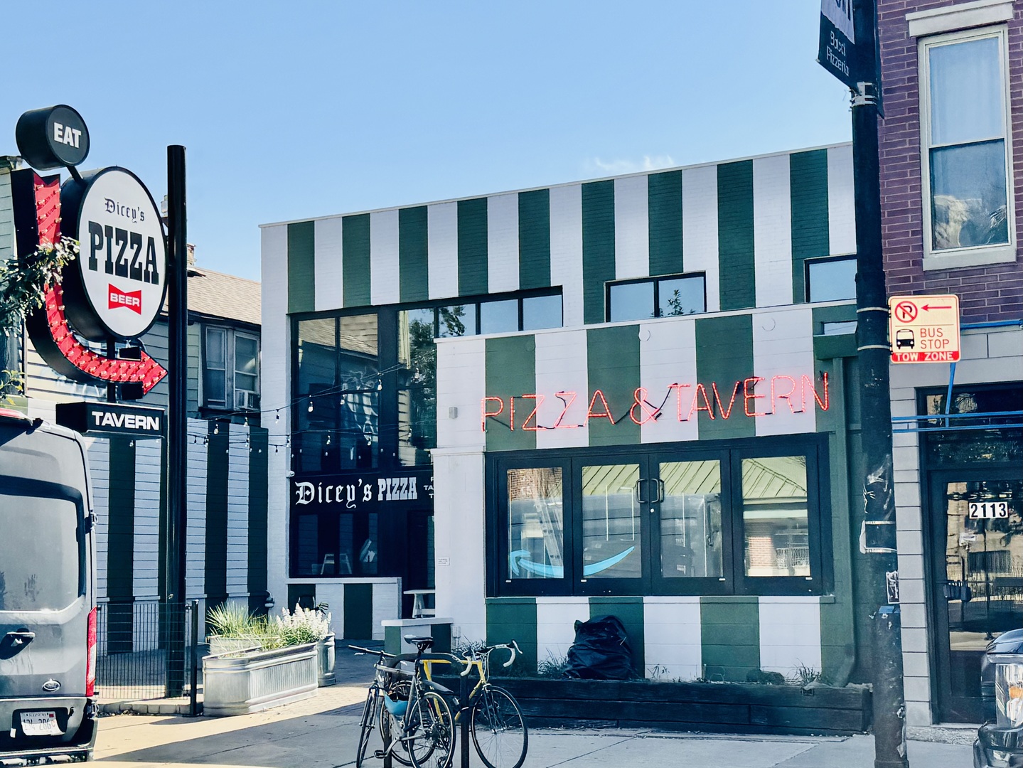 1834 West Rice Street, Unit A Chicago, IL 60622 - Photo 38 of 39 a front view of a brick building with a clock on a table