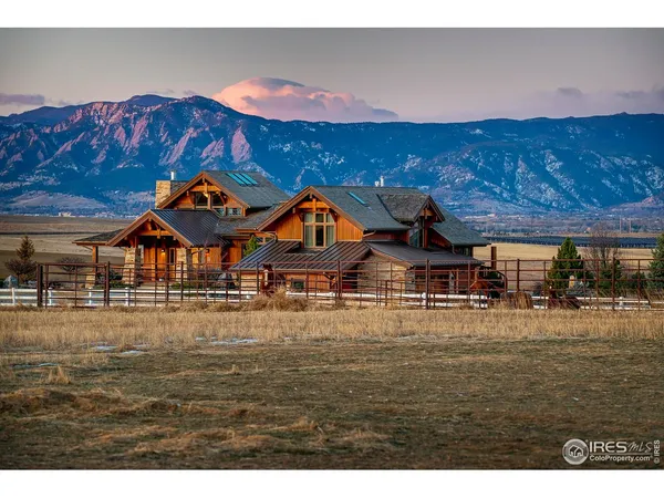 a view of a house with a big yard