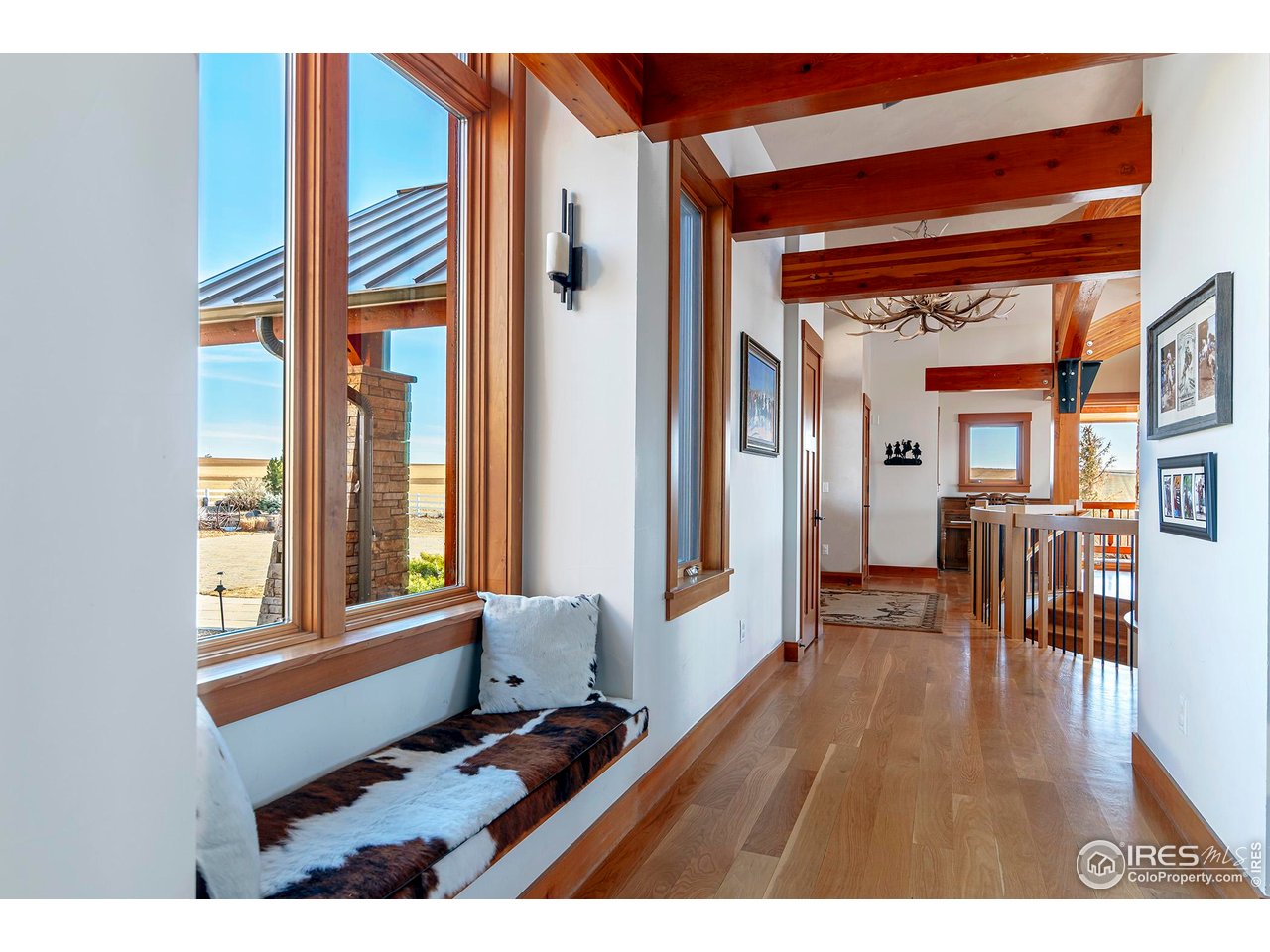 8642 Mineral Road Longmont, CO 80503 - Photo 13 of 50 a living room with furniture and a window