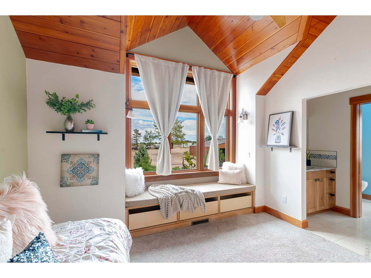 8642 Mineral Road Longmont, CO 80503 - Photo 26 of 50 a living room with furniture and a large window