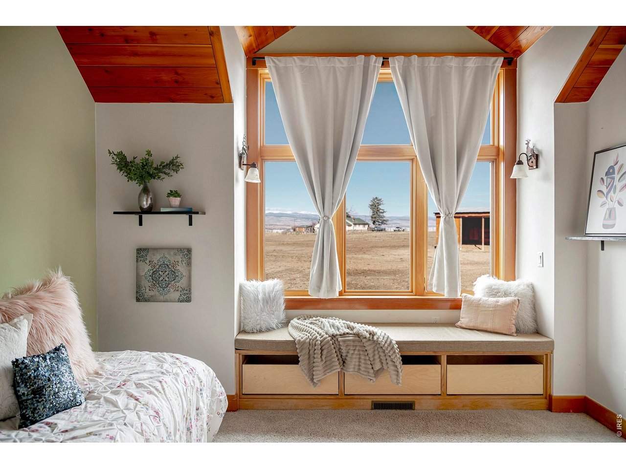 8642 Mineral Road Longmont, CO 80503 - Photo 27 of 50 a bedroom with a bed and a window