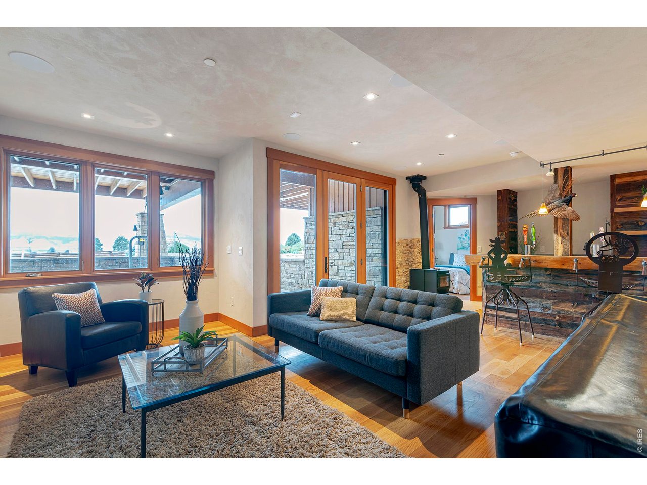 8642 Mineral Road Longmont, CO 80503 - Photo 31 of 50 a living room with furniture and a large window
