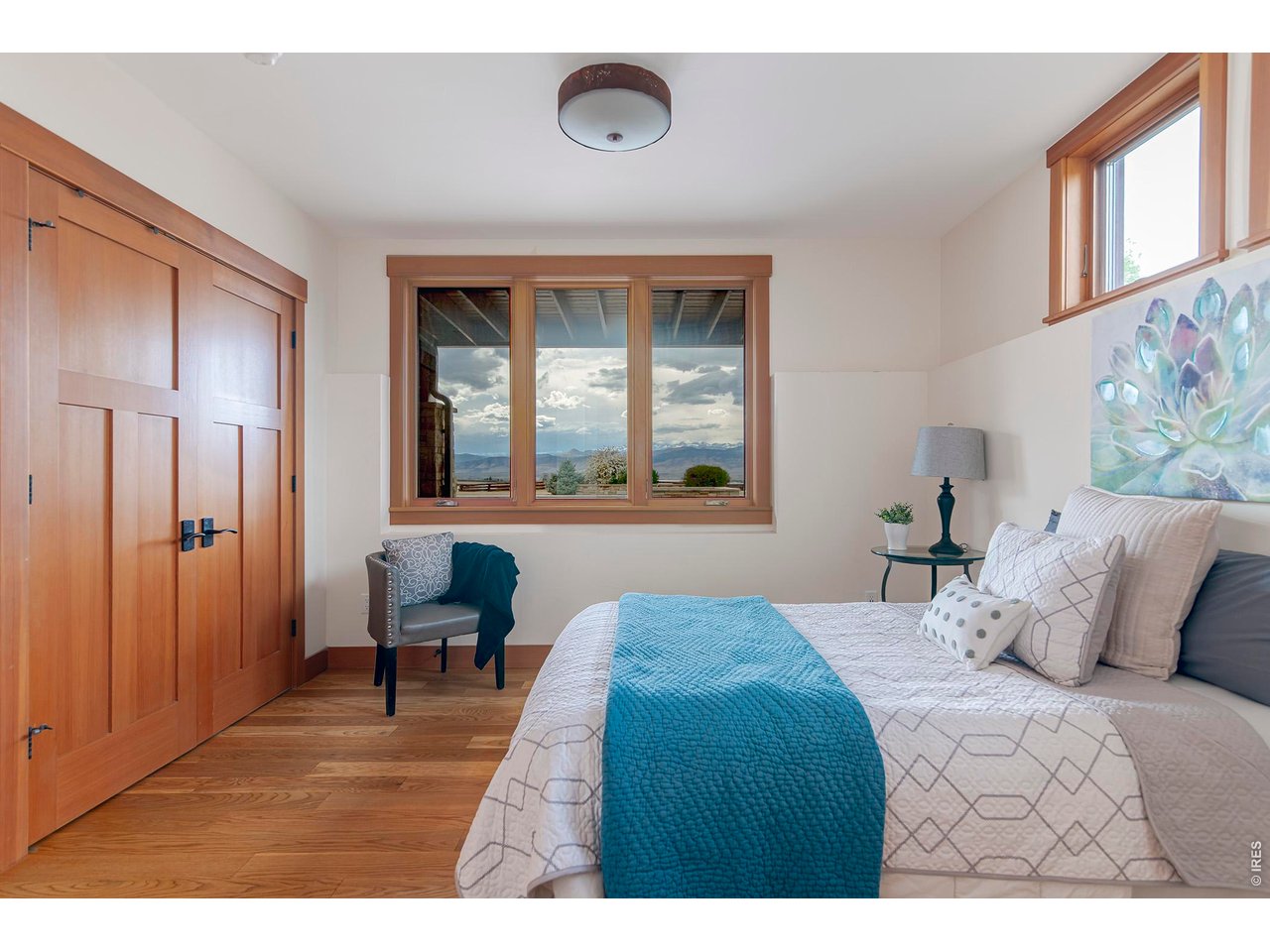 8642 Mineral Road Longmont, CO 80503 - Photo 33 of 50 a bedroom with a bed and a window