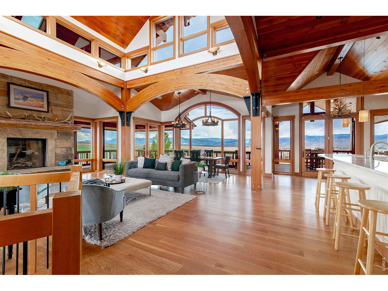 8642 Mineral Road Longmont, CO 80503 - Photo 9 of 50 a living room with fireplace furniture and a large window