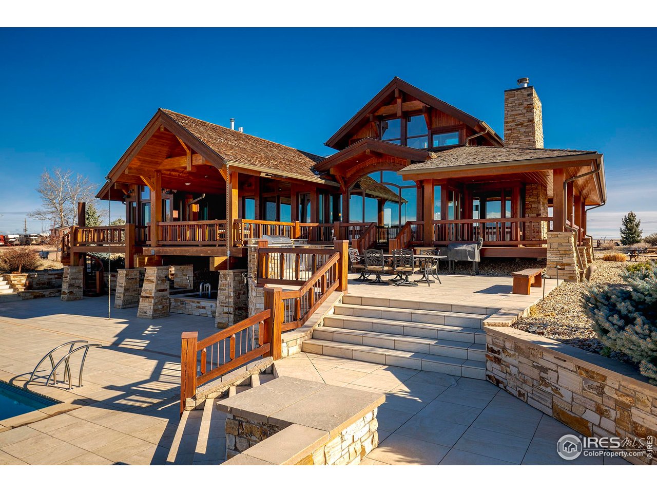 8642 Mineral Road Longmont, CO 80503 - Photo 9 of 41 Western face showing finishes and entertaining areas
