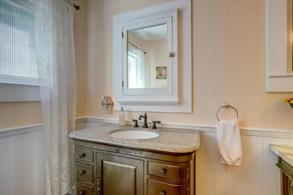 a stove top oven sitting inside of a kitchen