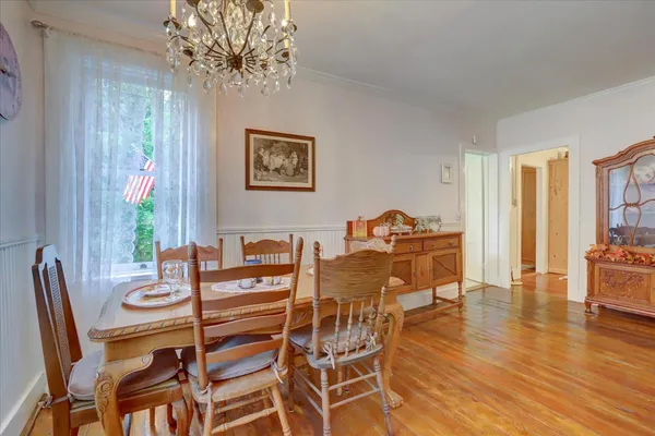 a bed room with a bed and a window