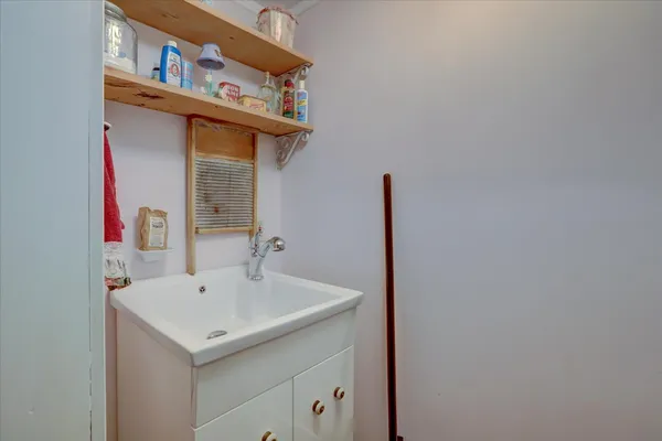 a bedroom with a bed and a closet