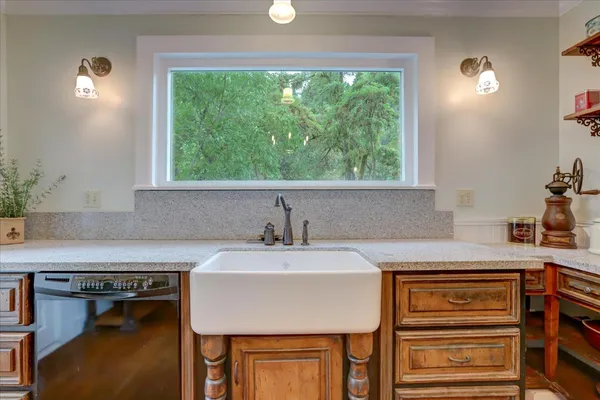 a view of a door and a window of the house