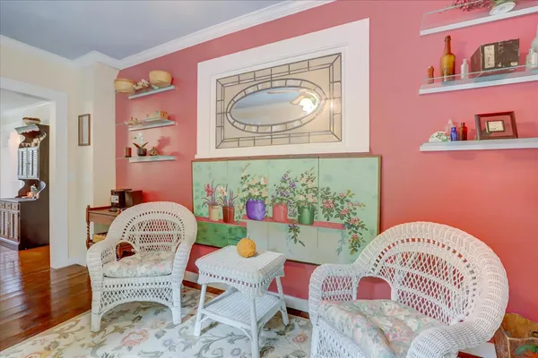 an aerial view of residential house with outdoor space and trees all around