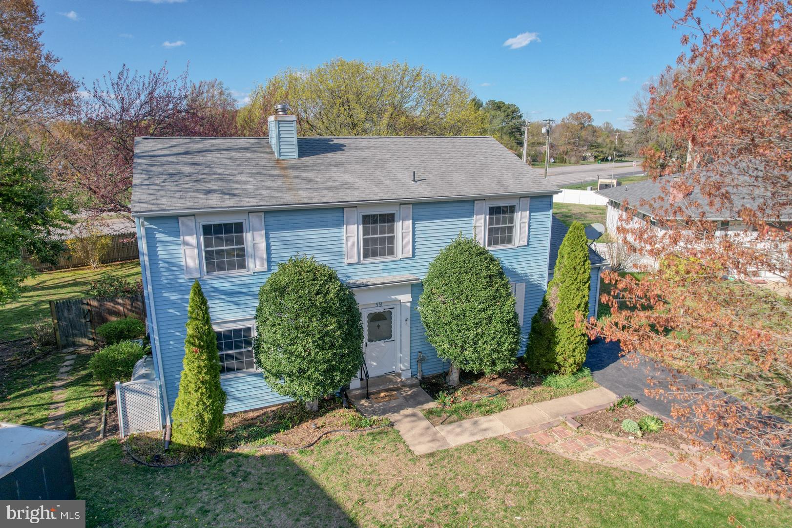front view of a house with a yard