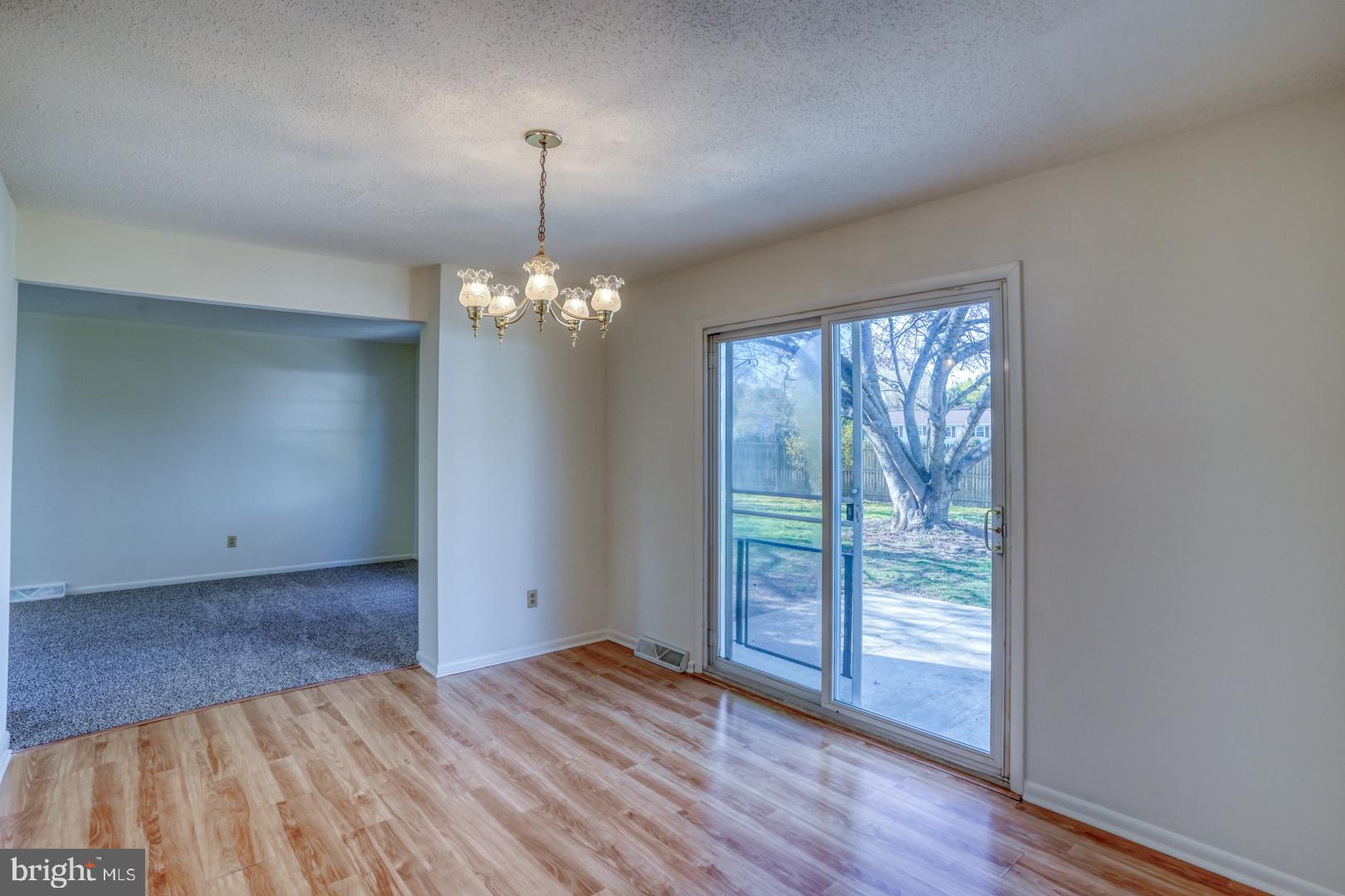 39 Duchess Circle Dover, DE 19901 - Photo 16 of 48 an empty room with wooden floor fan and windows