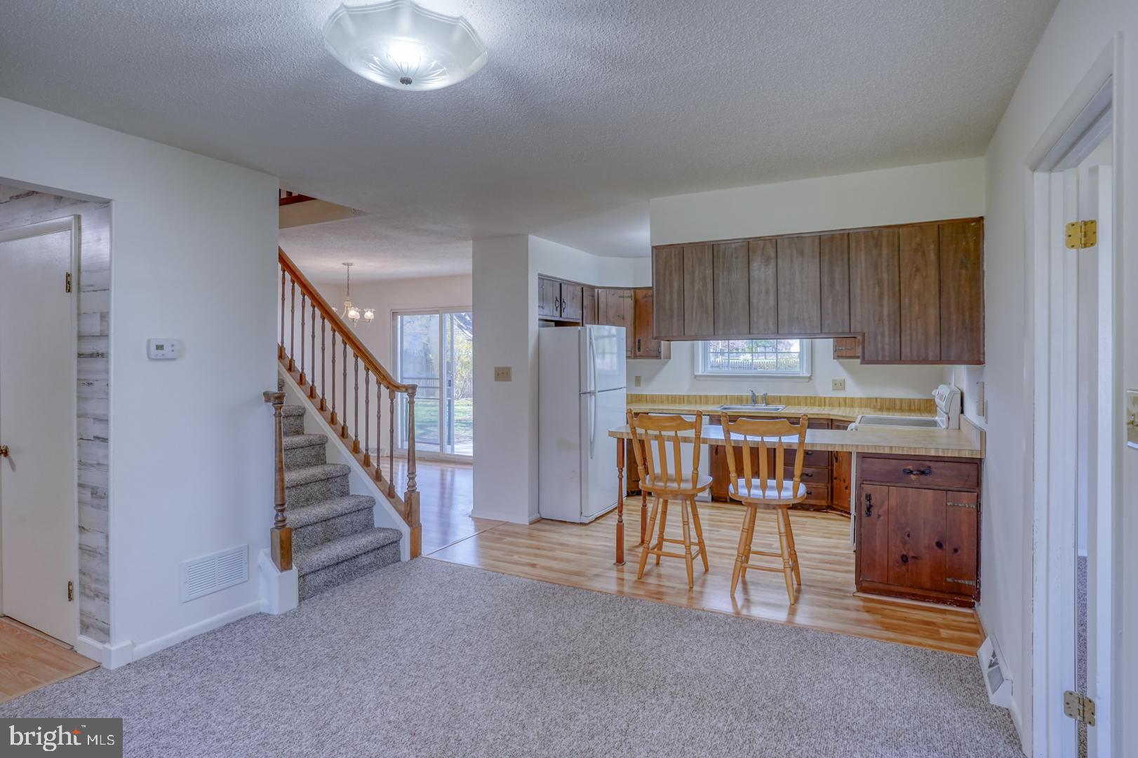 39 Duchess Circle Dover, DE 19901 - Photo 25 of 48 a kitchen with refrigerator and cabinets