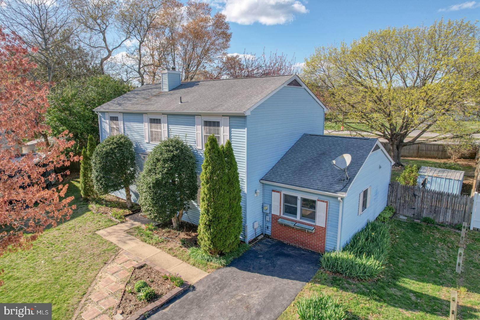 39 Duchess Circle Dover, DE 19901 - Photo 3 of 48 a front view of house with yard and trees in the background