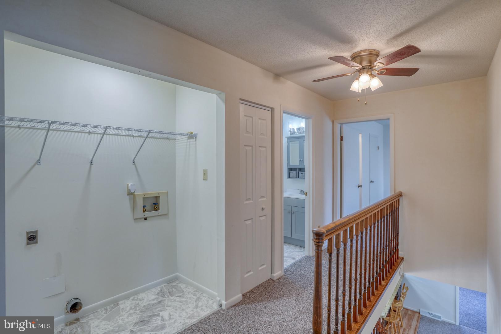 39 Duchess Circle Dover, DE 19901 - Photo 31 of 48 a view of a hallway with a chandelier fan