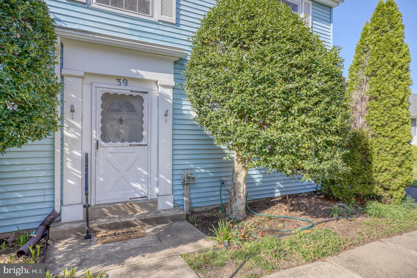 39 Duchess Circle Dover, DE 19901 - Photo 7 of 48 a front view of a house with garden