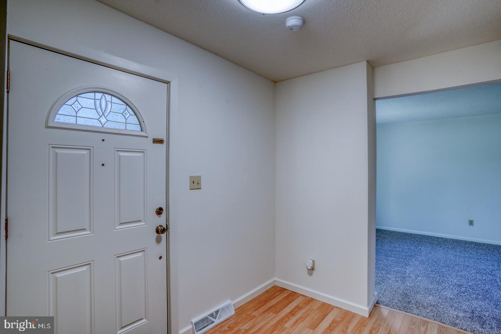 39 Duchess Circle Dover, DE 19901 - Photo 9 of 48 a view of front door with wooden floor
