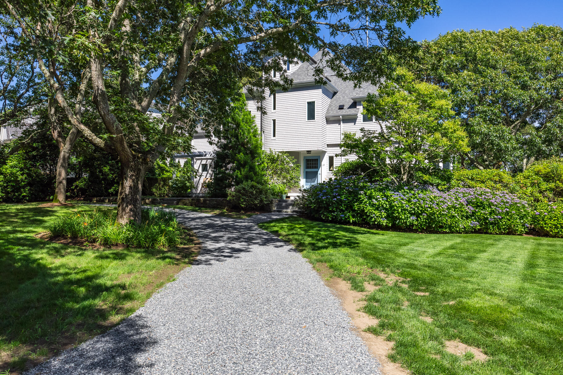 33 Pasture Road Cataumet, MA 02534 - Photo 3 of 90 a view of a house with a yard and large trees