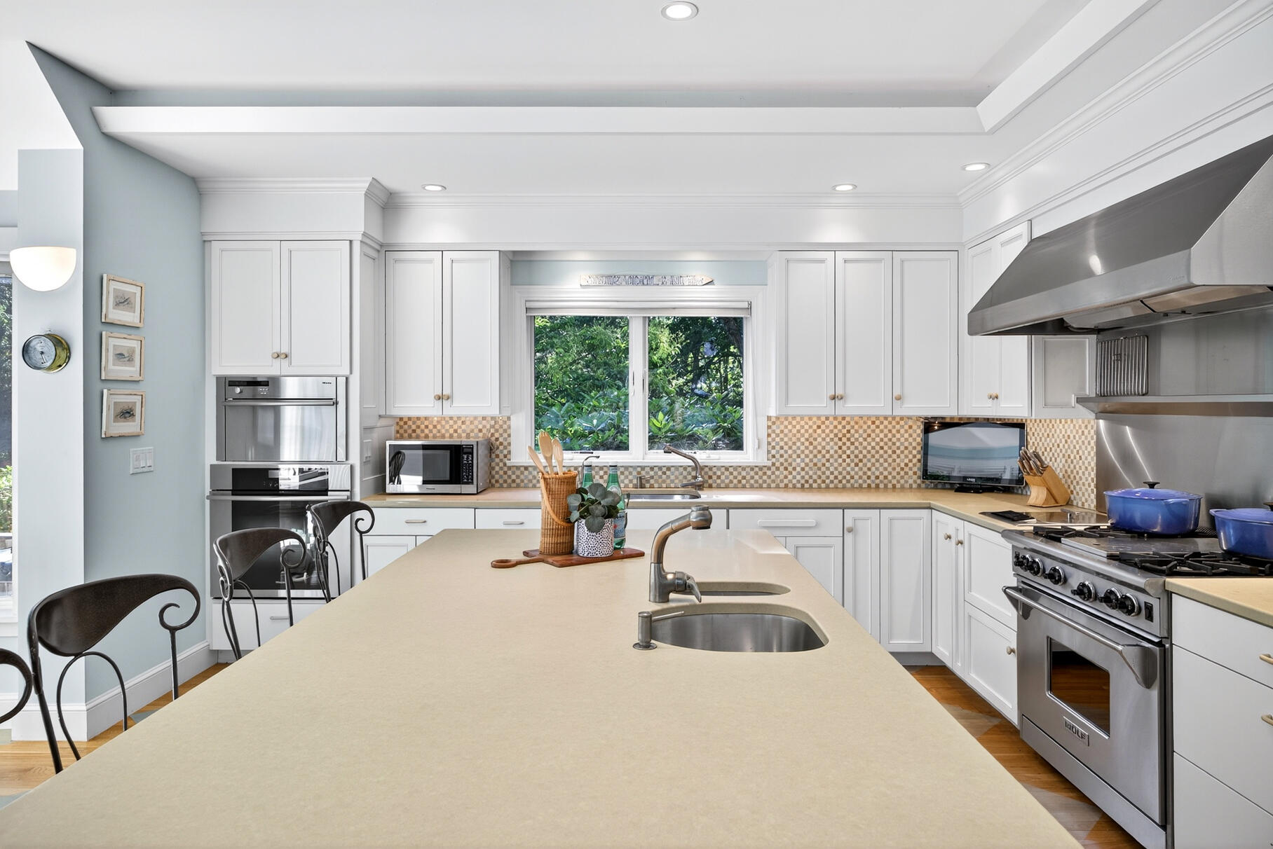 33 Pasture Road Cataumet, MA 02534 - Photo 39 of 90 a kitchen that has a lot of cabinets a sink and a stove in it