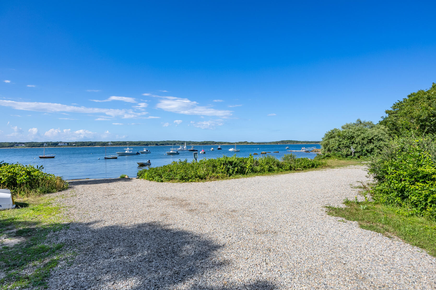 33 Pasture Road Cataumet, MA 02534 - Photo 79 of 90 a view of an ocean and a building