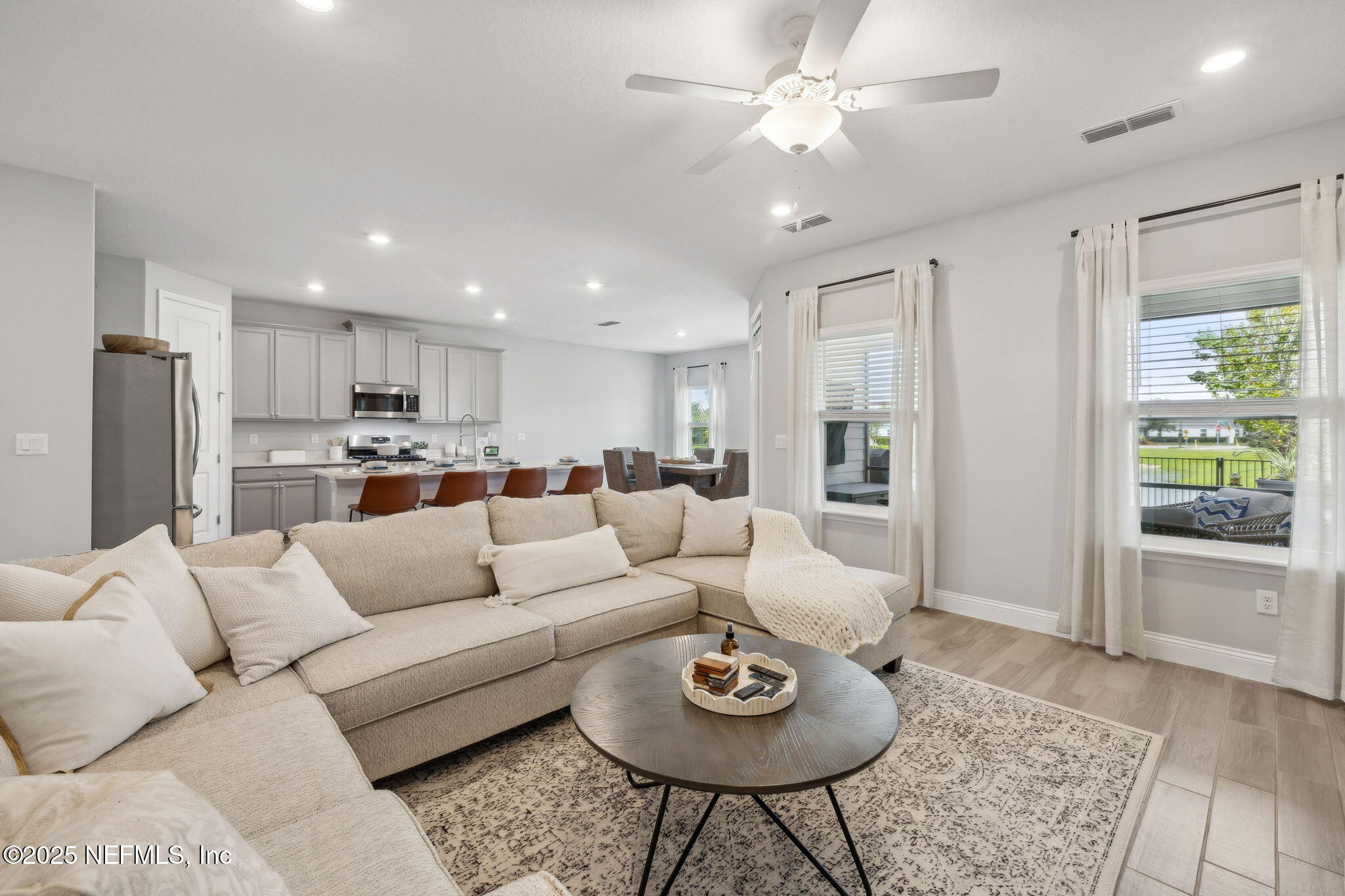 228 Killarney Avenue St. Johns, FL 32259 - Photo 64 of 64 a living room with furniture and a large window