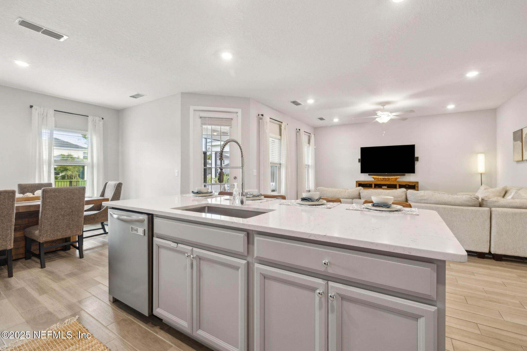 228 Killarney Avenue St. Johns, FL 32259 - Photo 14 of 64 a kitchen with a sink and white cabinets