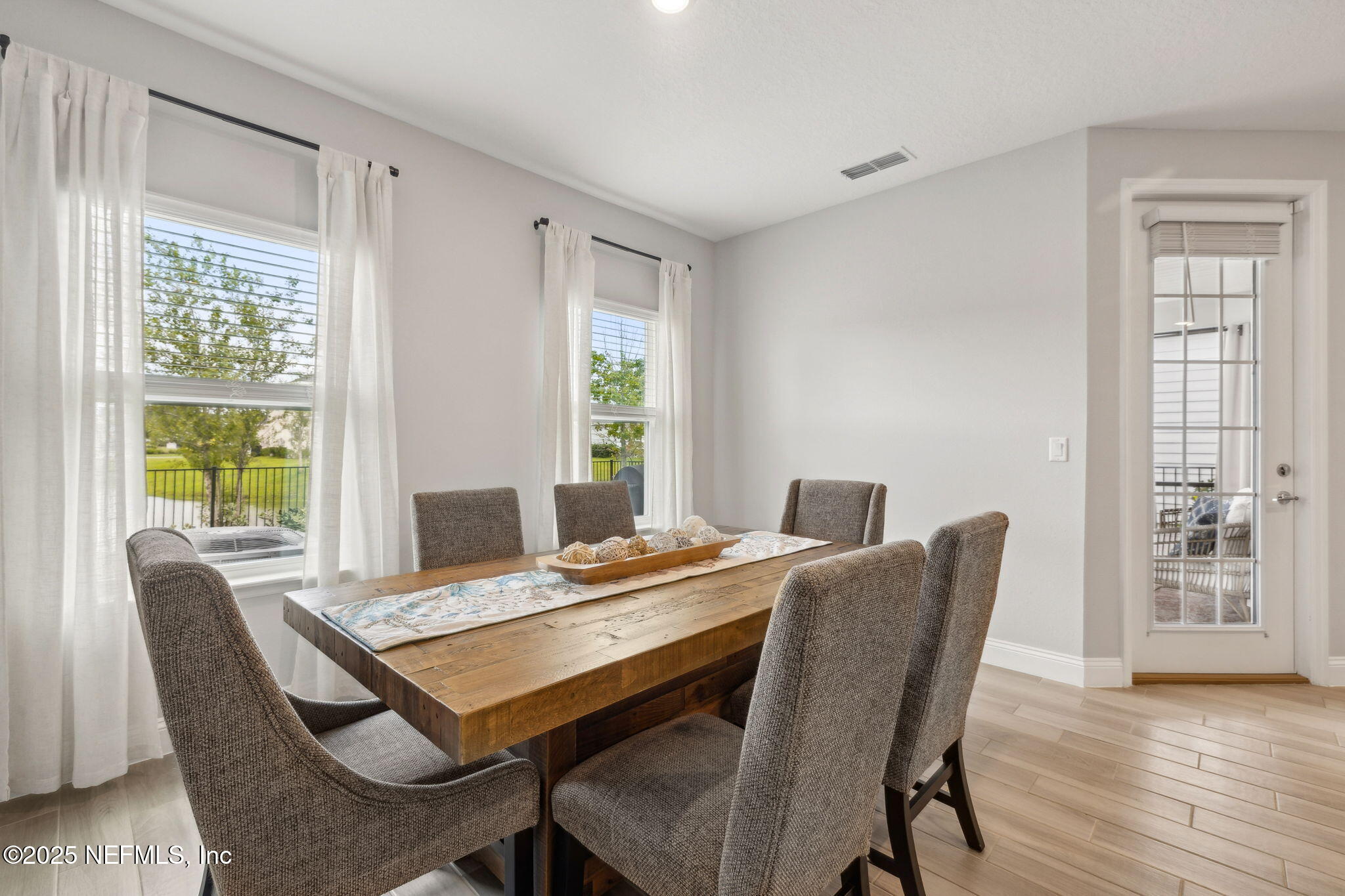 228 Killarney Avenue St. Johns, FL 32259 - Photo 15 of 64 a view of a dining room with furniture window and wooden floor