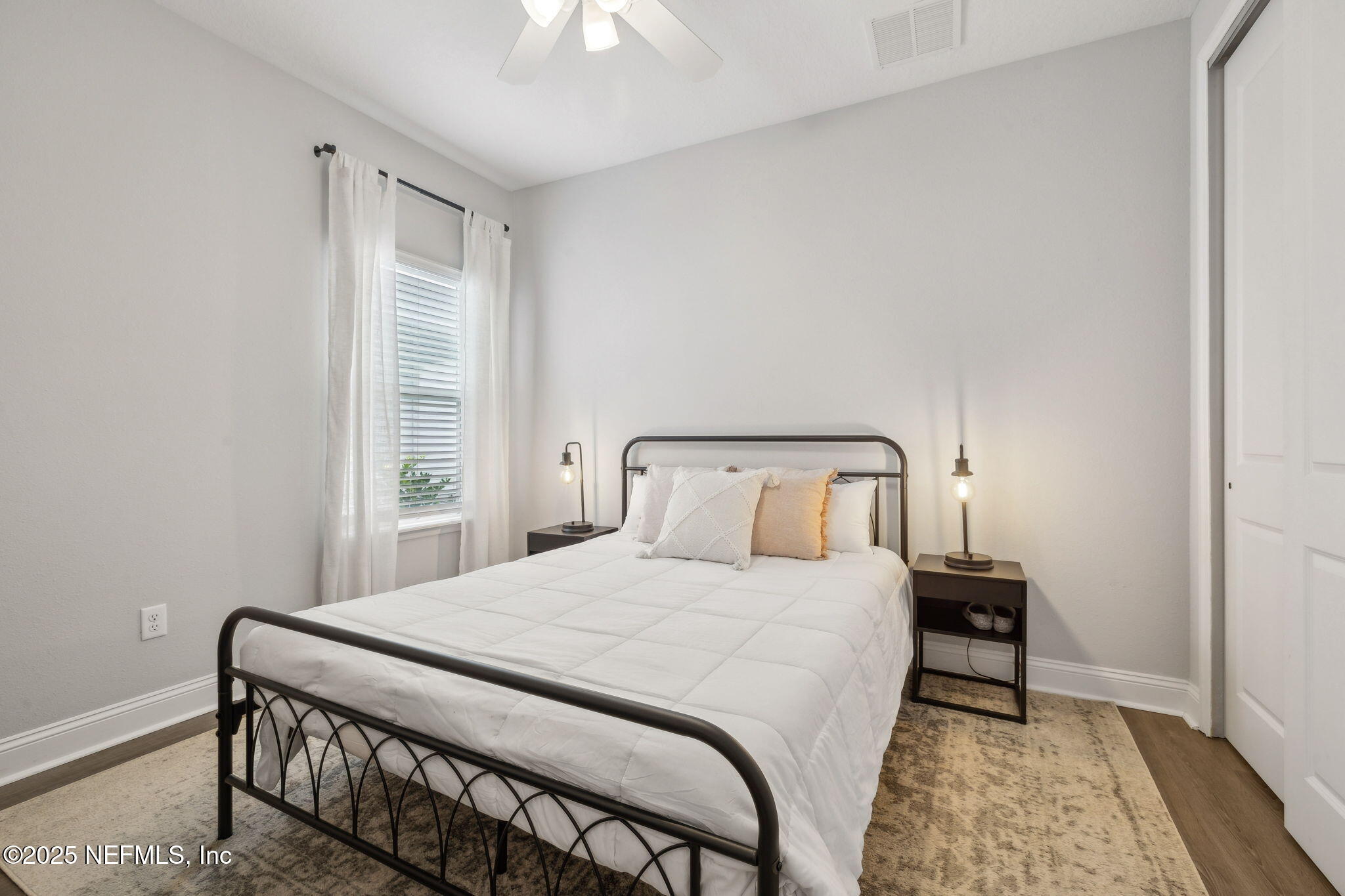 228 Killarney Avenue St. Johns, FL 32259 - Photo 17 of 64 a bedroom with a bed and a window