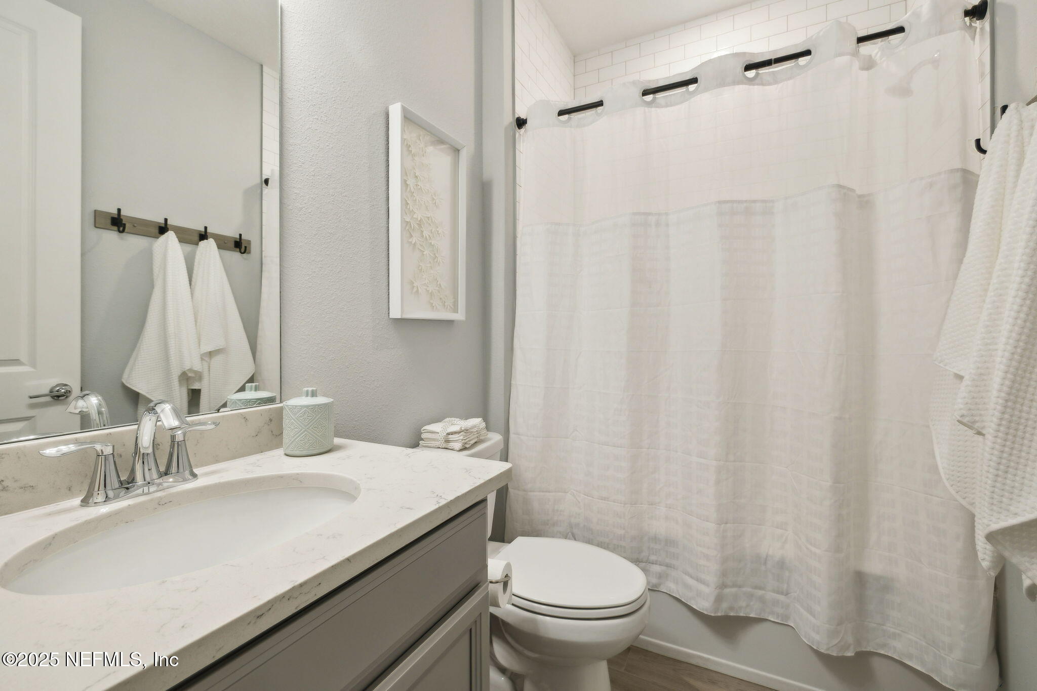 228 Killarney Avenue St. Johns, FL 32259 - Photo 19 of 64 a bathroom with a sink toilet and shower