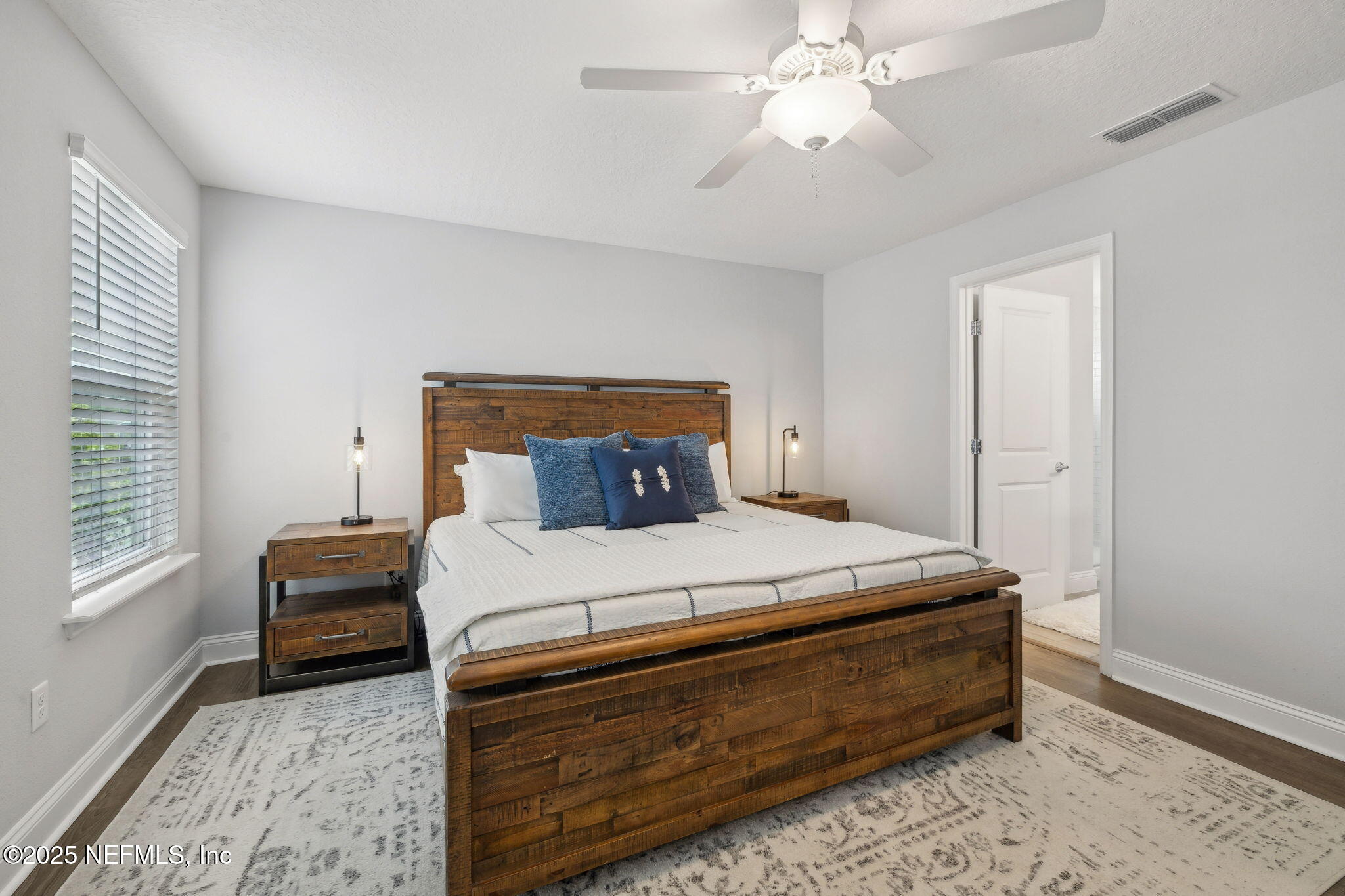 228 Killarney Avenue St. Johns, FL 32259 - Photo 22 of 64 a bedroom with a bed and a window